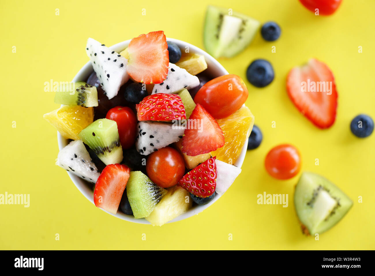 Fruit salad bowl fresh summer fruits and vegetables healthy organic ...