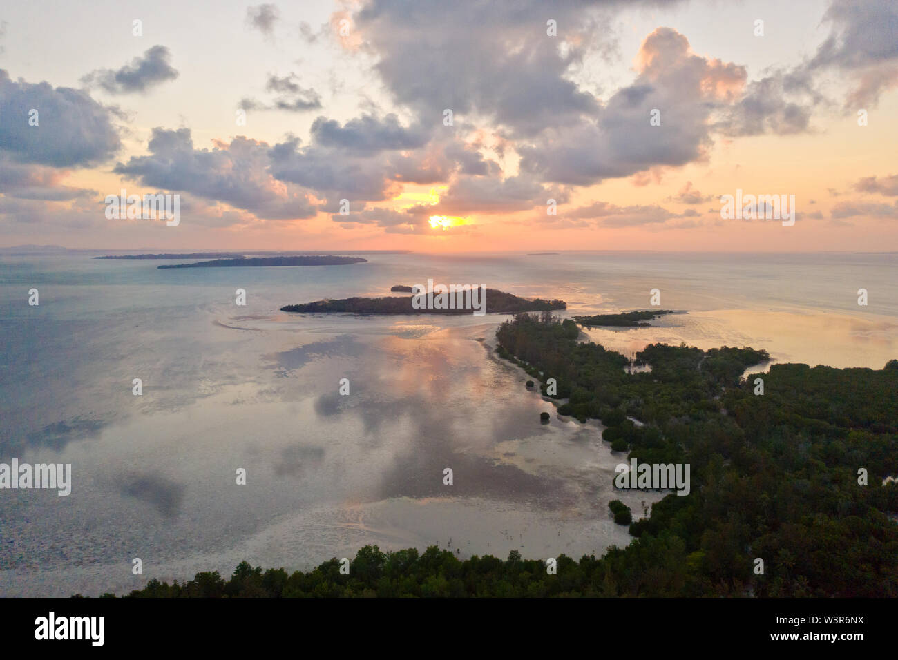 Sunset over the sea with islands, view from above. Philippine Islands ...