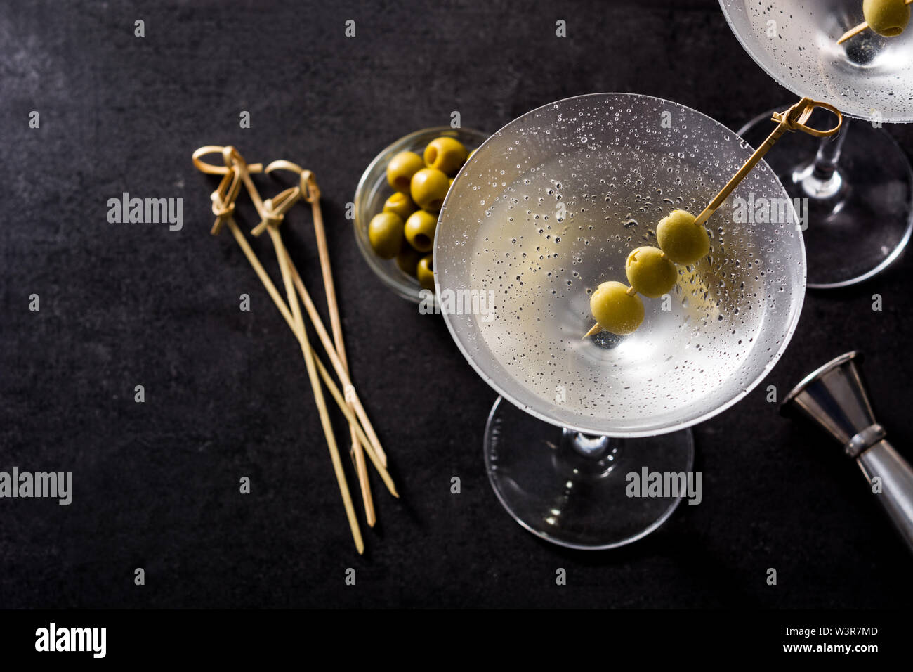 Classic Dry Martini with olives on black background.Copyspace Stock Photo Alamy
