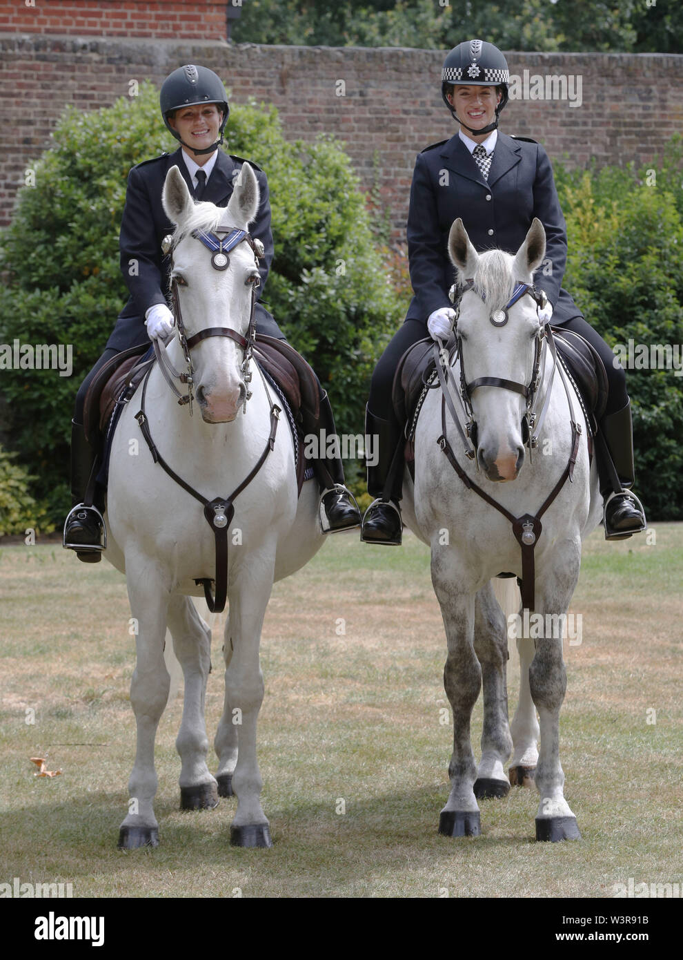 Metropolitan Police's Assistant Horse Trainer Karen Last (left) with