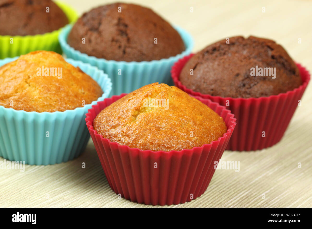 Cupcakes in colorful silicone molds Stock Photo Alamy