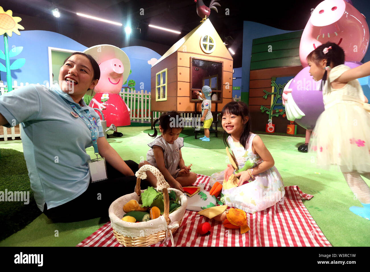 Shanghai, China's Shanghai. 17th July, 2019. People take part in a summer party event at Peppa Pig World of Play, an indoor theme park on the British animation hit, in east China's Shanghai, July 17, 2019. Credit: Chen Fei/Xinhua/Alamy Live News Stock Photo