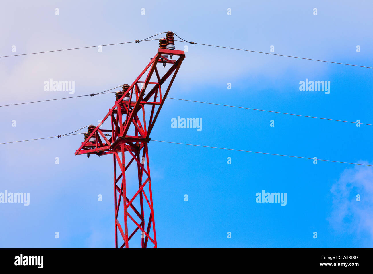High voltage tower on the blue sky Stock Photo - Alamy