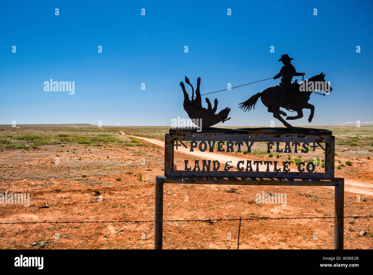 Wrought iron sign at ranch entrance, prairie in Chaves County, New Mexico, USA Stock Photo