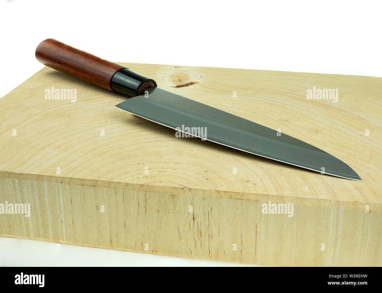 kitchen knife and wood butcher block countertop on white background Stock Photo