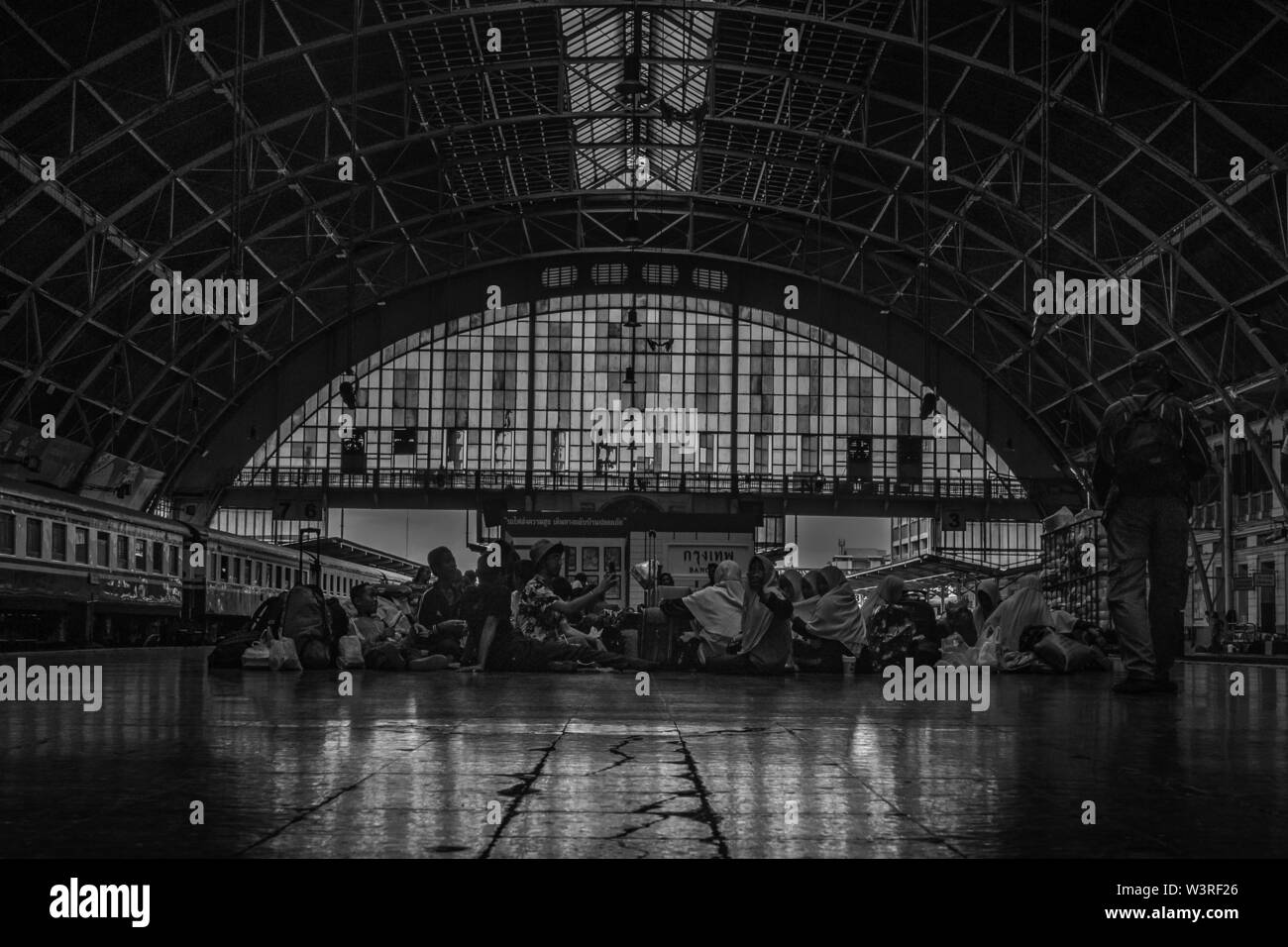 Bangkok, thailand - jun 29, 2019 : Peoples who sit and wait to return to their homeland. Bangkok Railway Station or Hua Lamphong Station is the main r Stock Photo