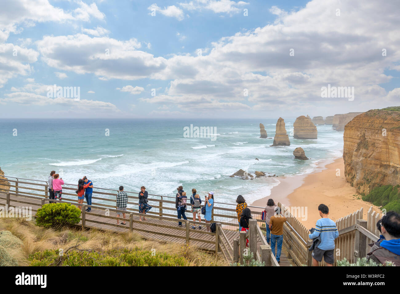 Tourists at the viewpoint for the Twelve Apostles, Port Campbell National Park, Great Ocean Road, Victoria, Australia Stock Photo