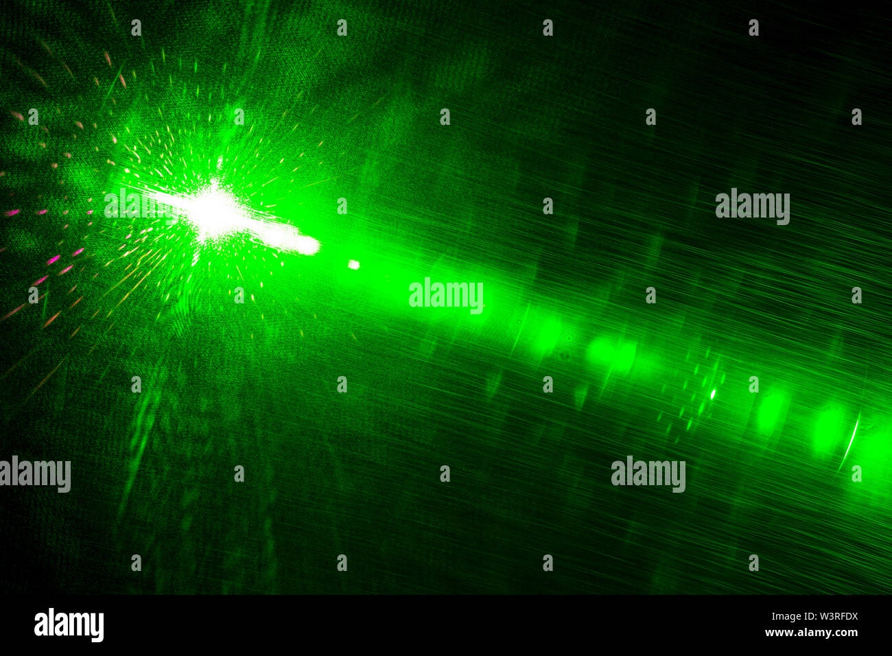 Camera lens flare by laser light create circles of objective iris