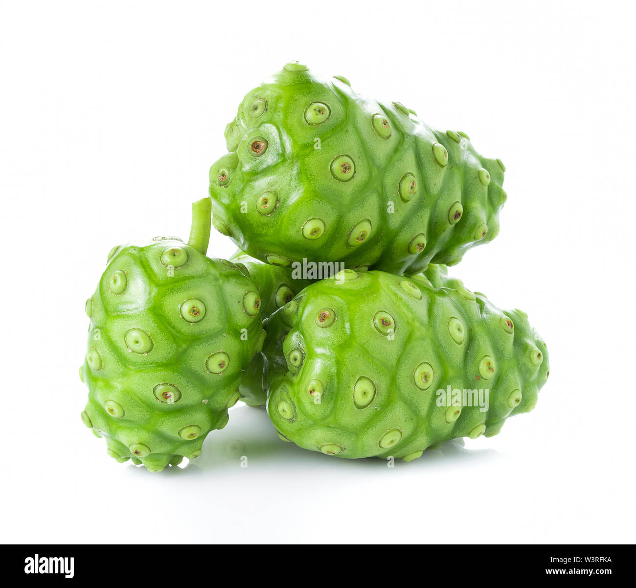 Il Noni frutti con succo di Noni Foto stock - Alamy