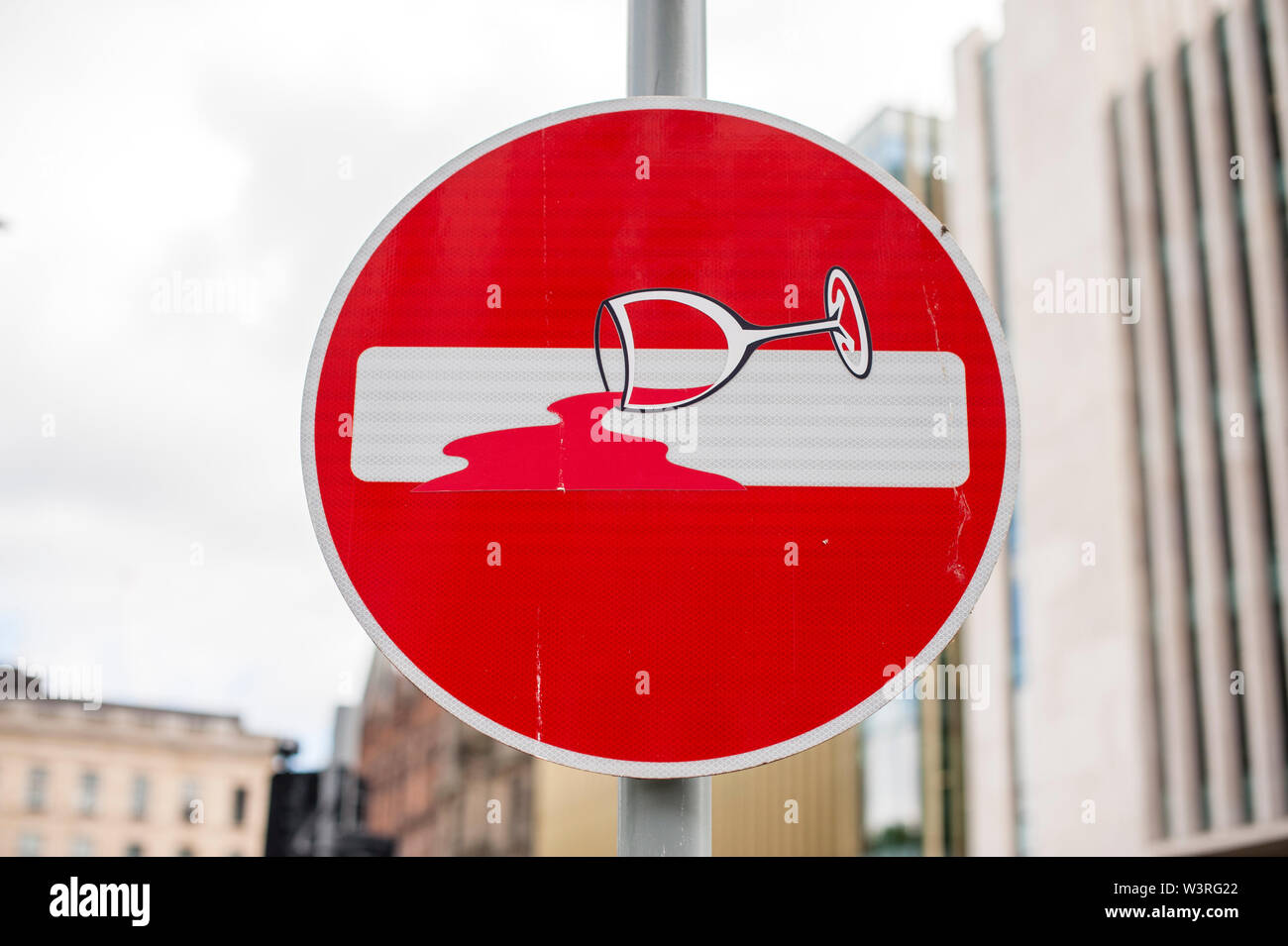 Street signs artistically modified by Clet Abraham in Edinburgh