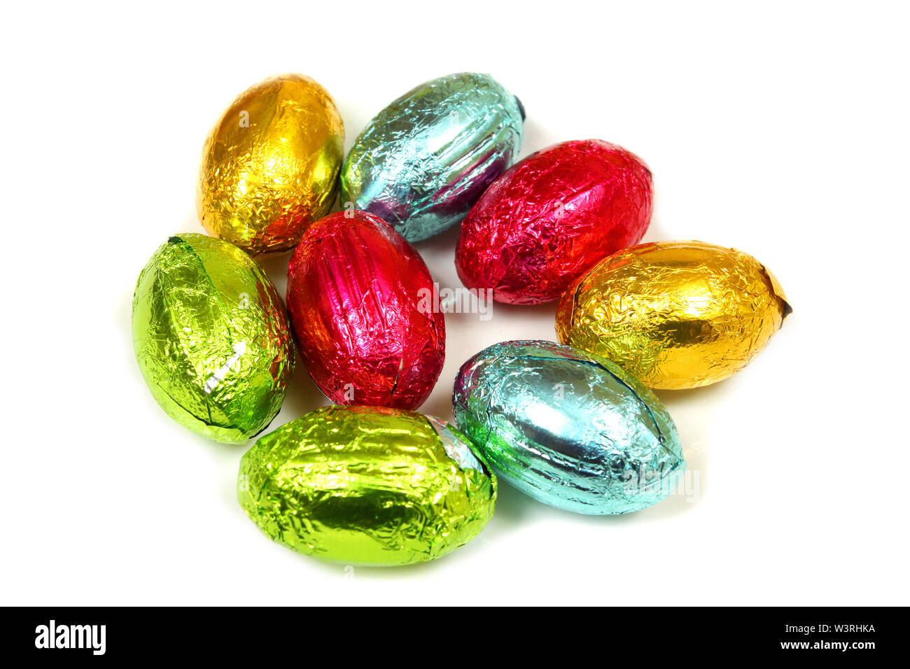 Colorful chocolate Easter eggs over white Stock Photo