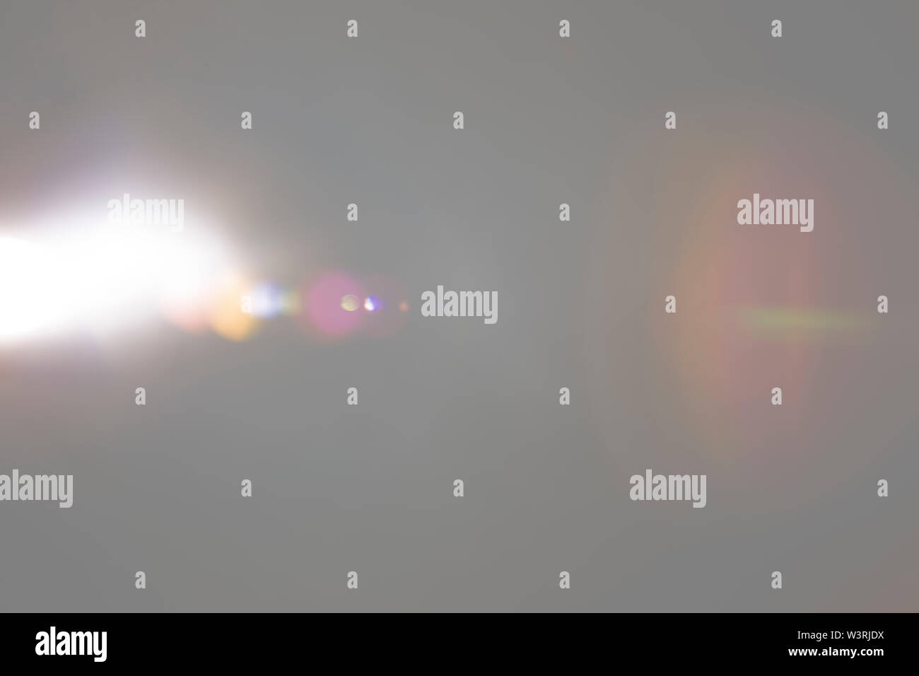 Solar camera lens flare light create ring of objective iris shapes of ...