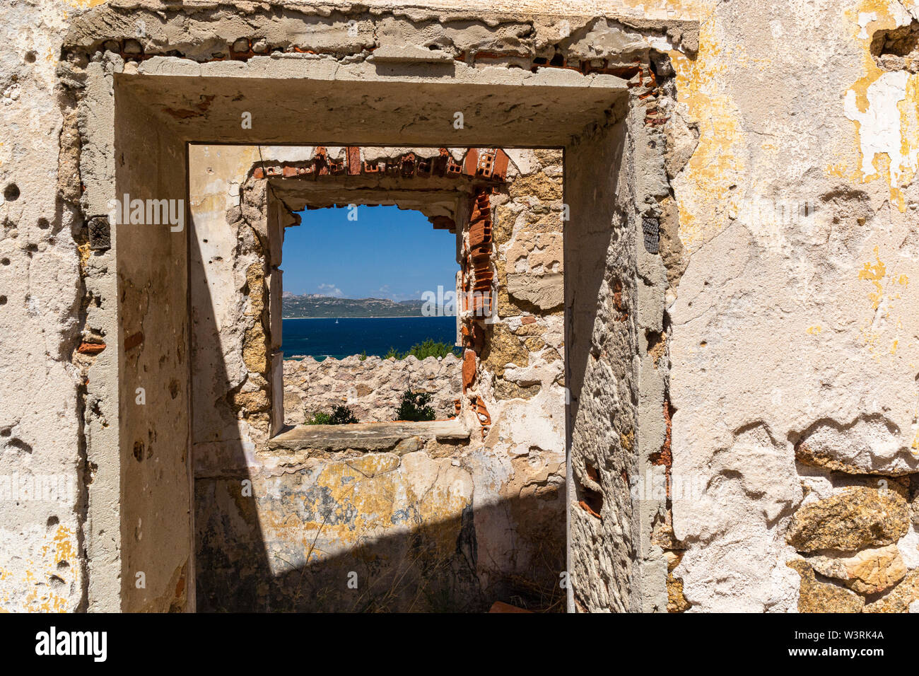 Doorway and Window Framed Sardinian Coastal View. Detail Scenic Study from a Derelict WW2 Building, on the Cliff Edge #2; Baia Sardinia, Sardinia, Stock Photo