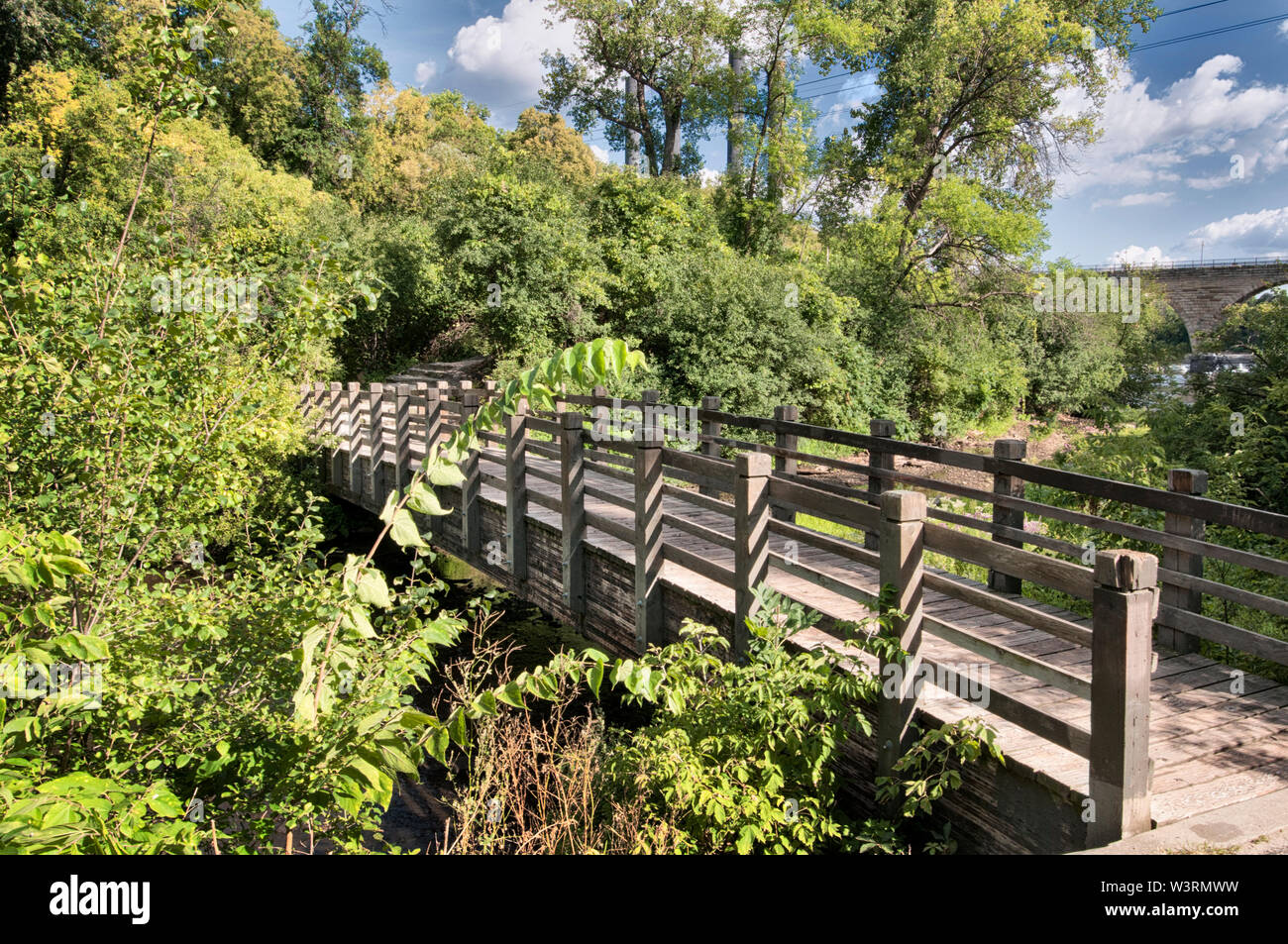 Rustic wooden pedestrian bridge hi-res stock photography and images - Alamy