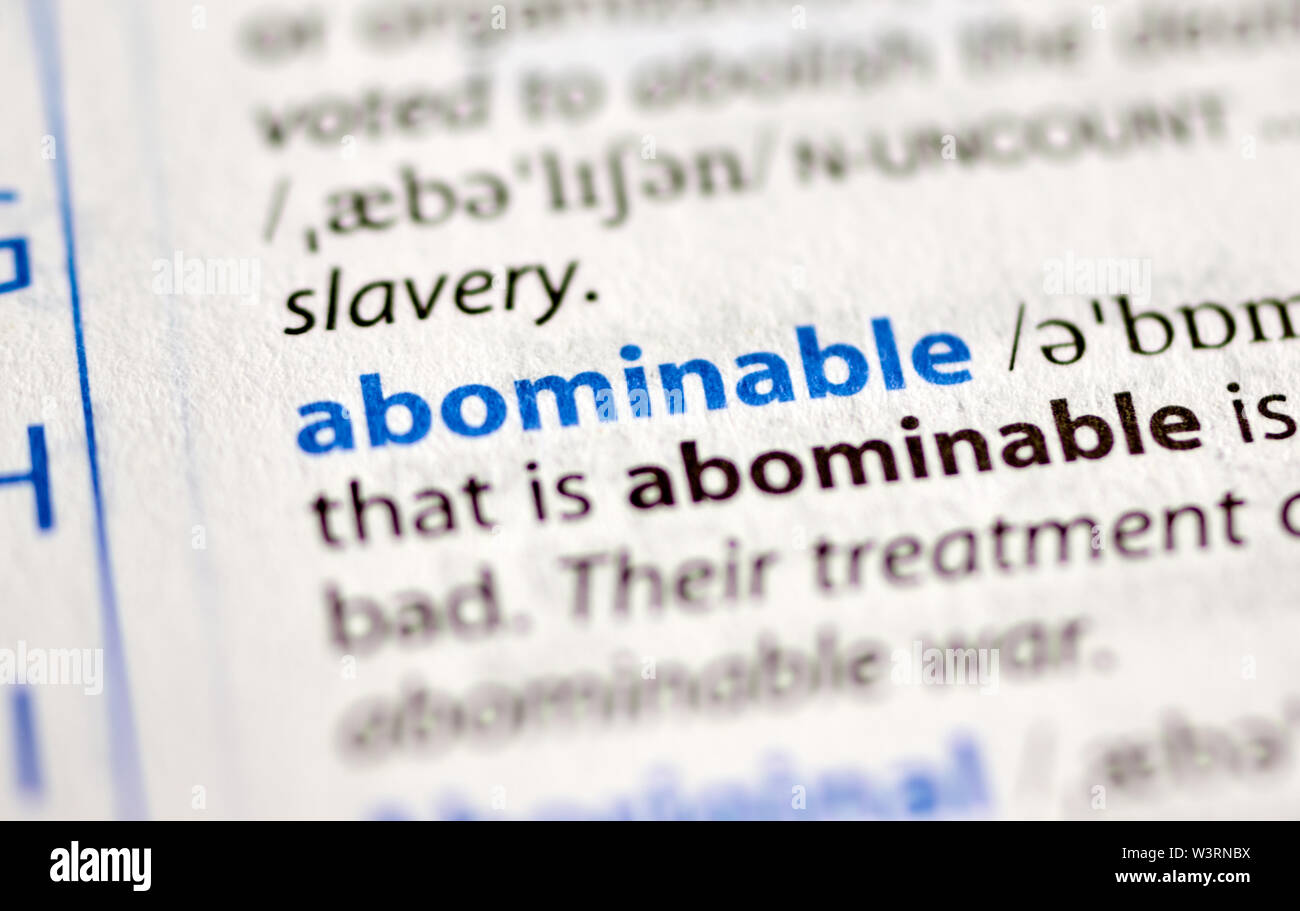 MONTREAL, CANADA - JULY 17, 2019: word abominable in a dictionay with meaning. Close-up and selective focus. Stock Photo