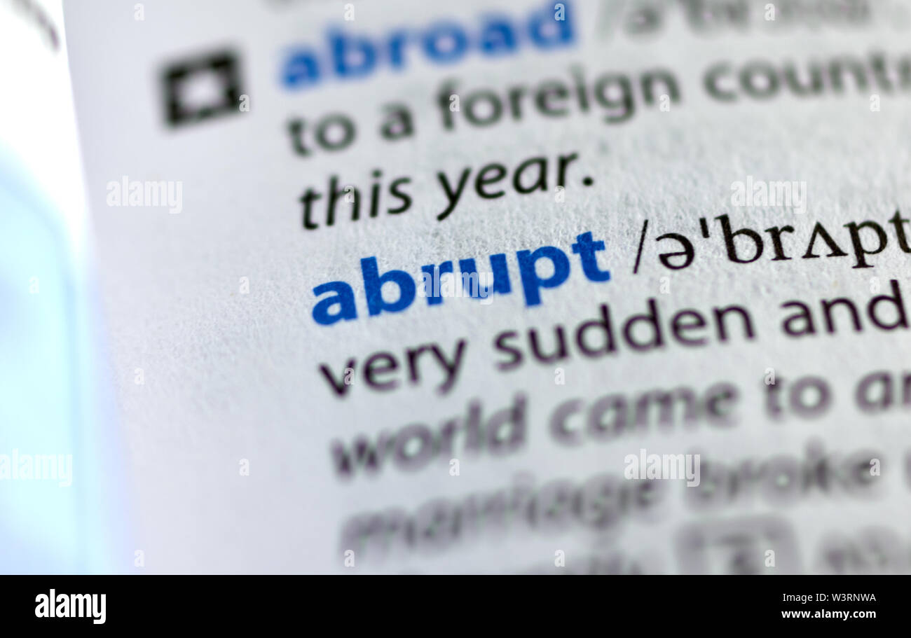 MONTREAL, CANADA - JULY 17, 2019: word abrupt in a dictionay with meaning. Close-up and selective focus. Stock Photo