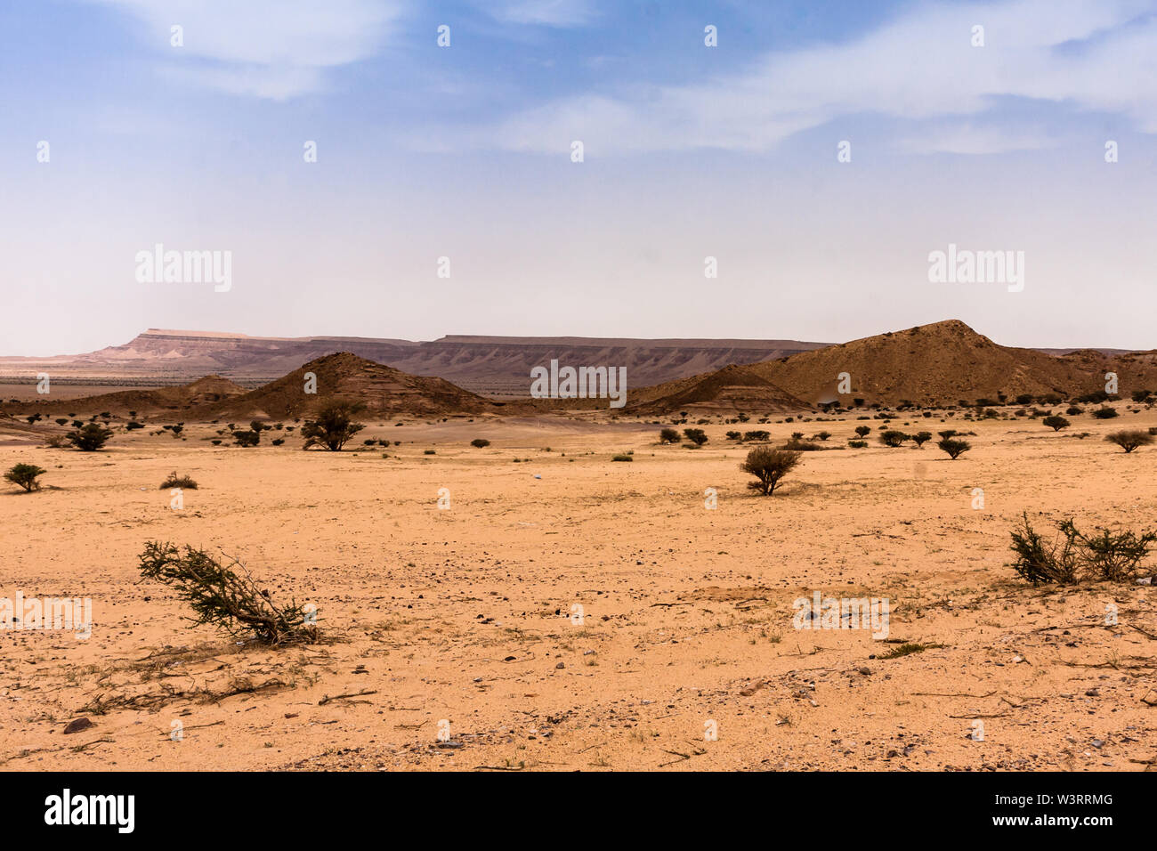 A desert landscape south-west of Riyadh; A combination of plain and rocky hill terrain typical for Riyadh Province Stock Photo