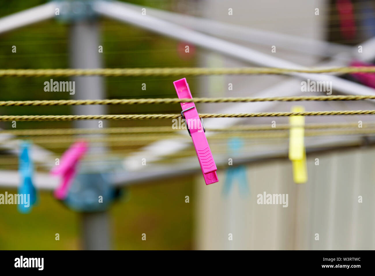 pink clothespin on drying rack in Umea Stock Photo