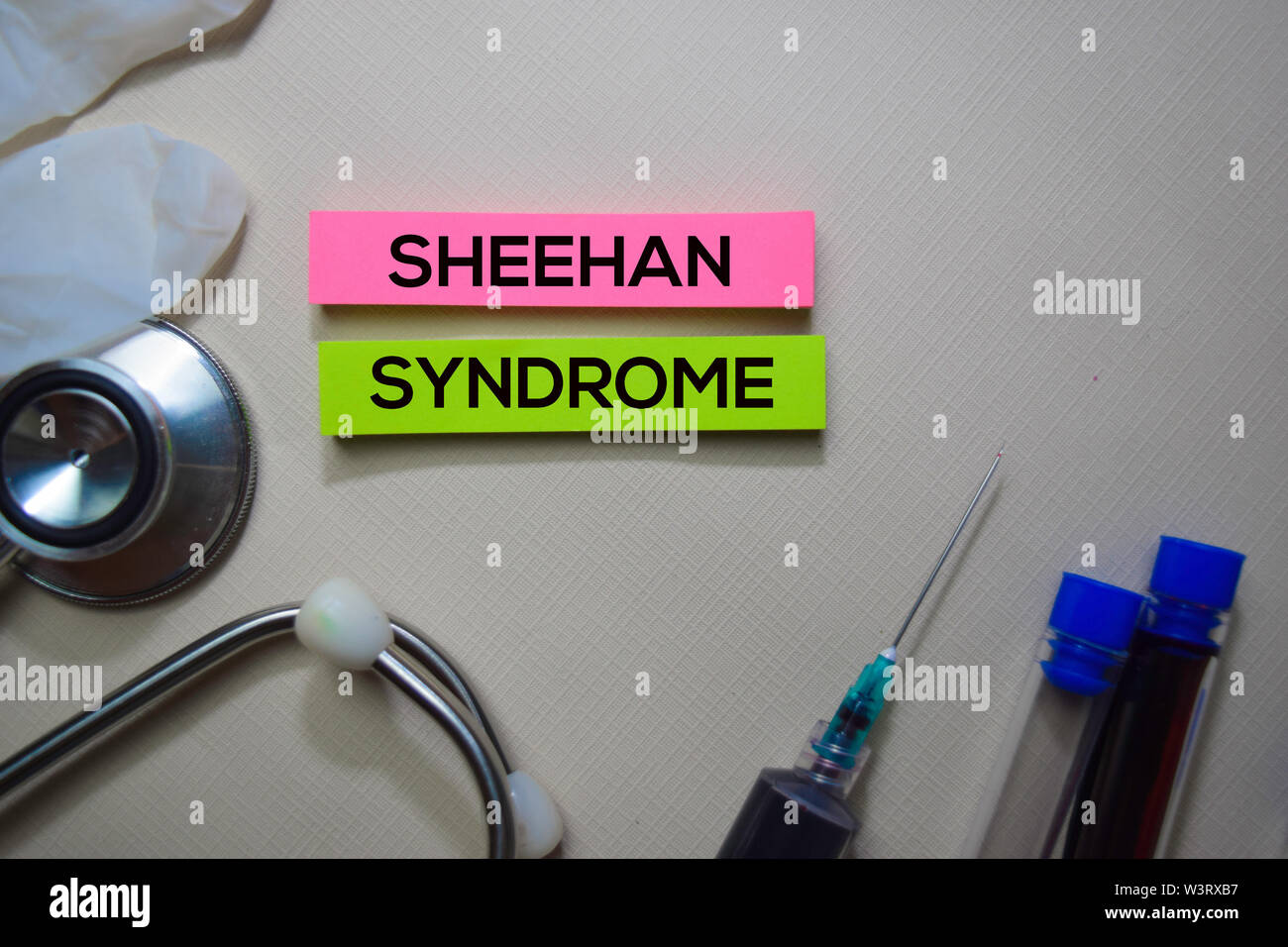 Sheehan Syndrome text on Sticky Notes. Top view isolated on office desk. Healthcare/Medical concept Stock Photo