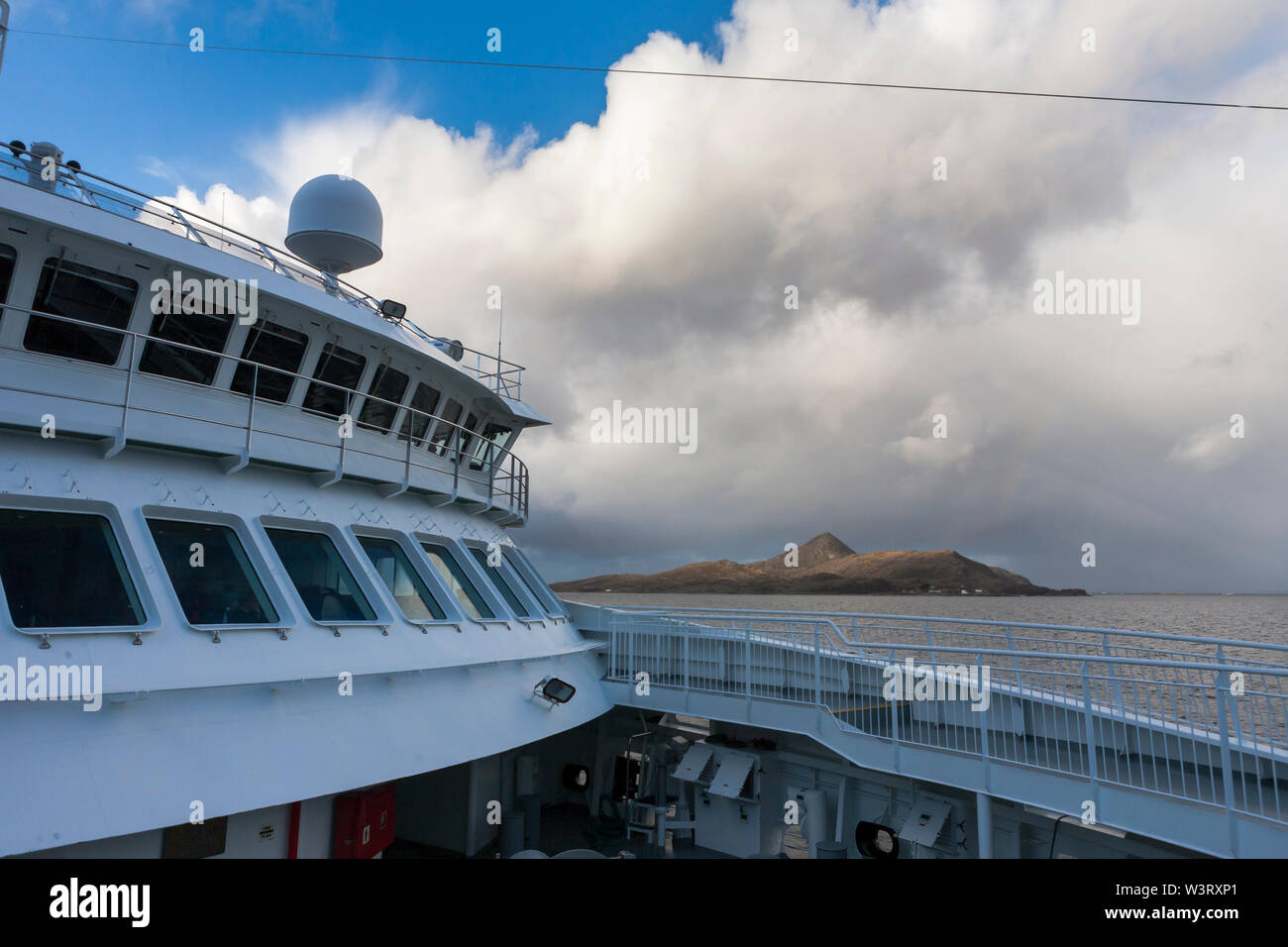 Hurtigruten ship MS Spitsbergen passing Fleina, Nordland, Norway Stock Photo