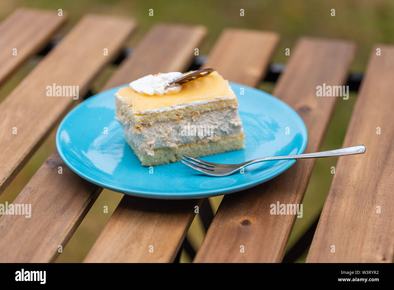 Cream nut cuts on a plate with a fork Stock Photo