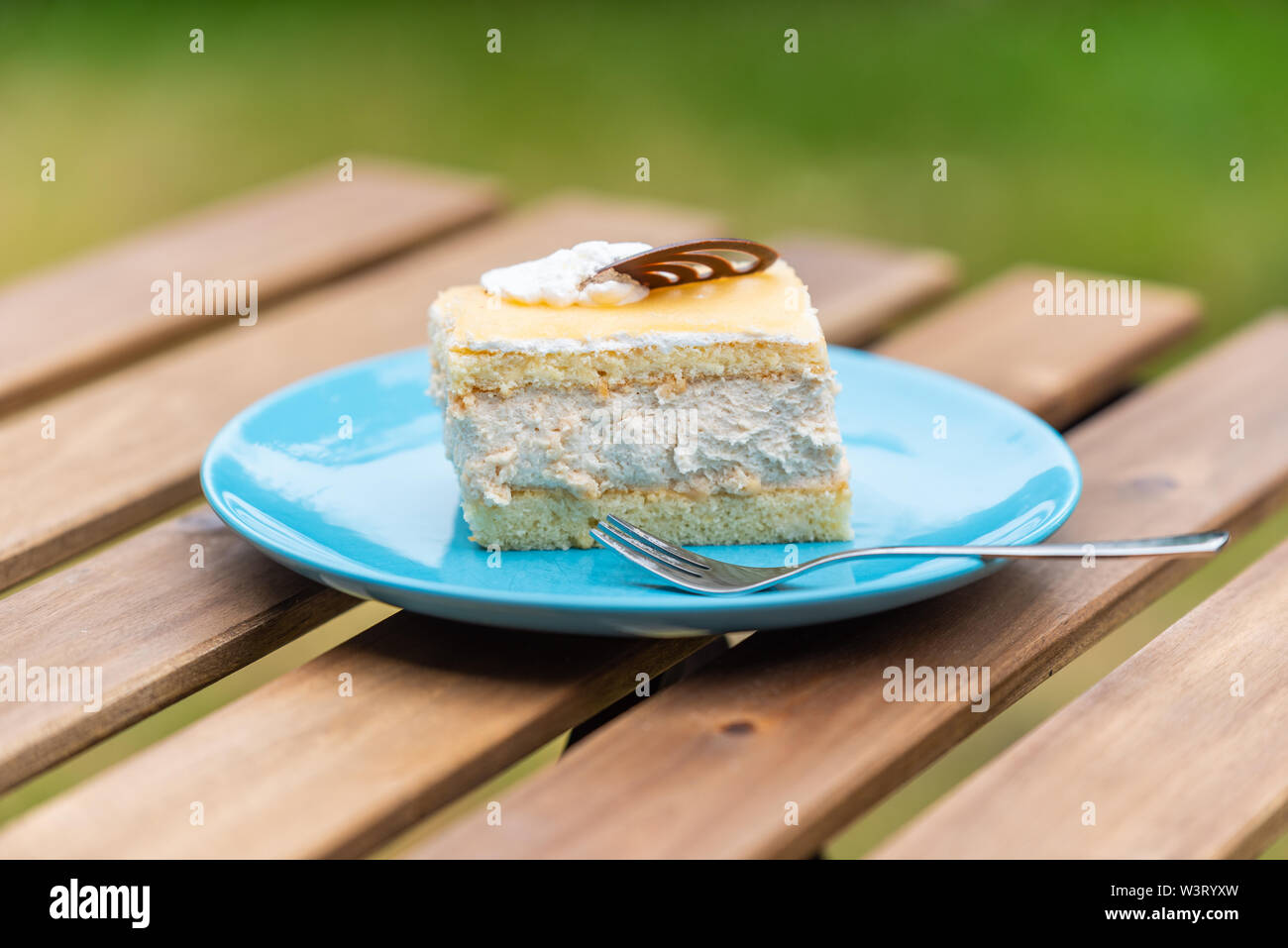 Cream nut cuts on a plate with a fork Stock Photo