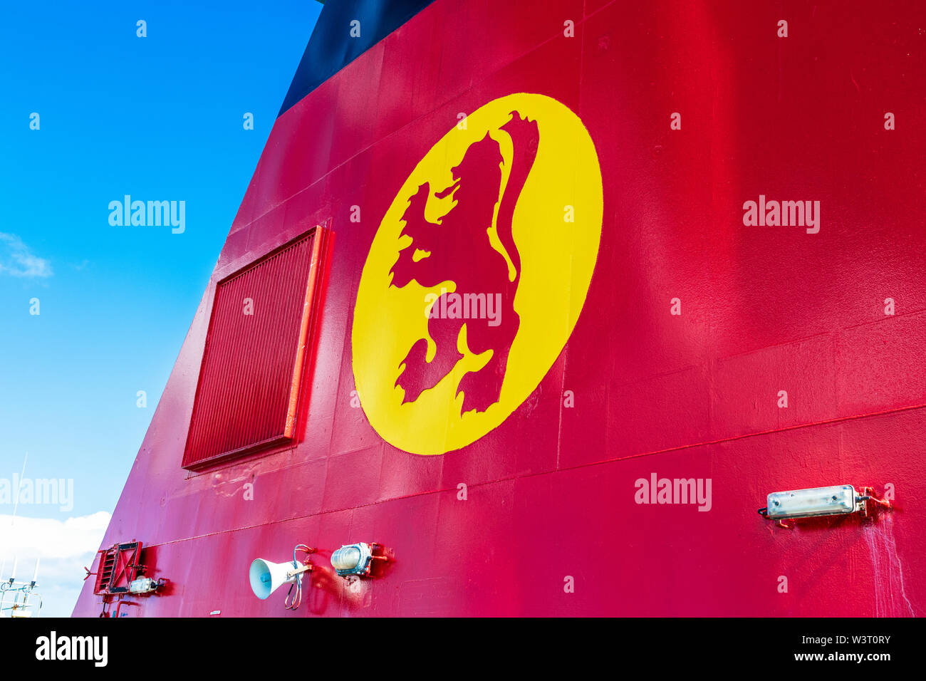 Corporate logo of Caledonian MacBrayne shipping line, on the side of the funnel Stock Photo