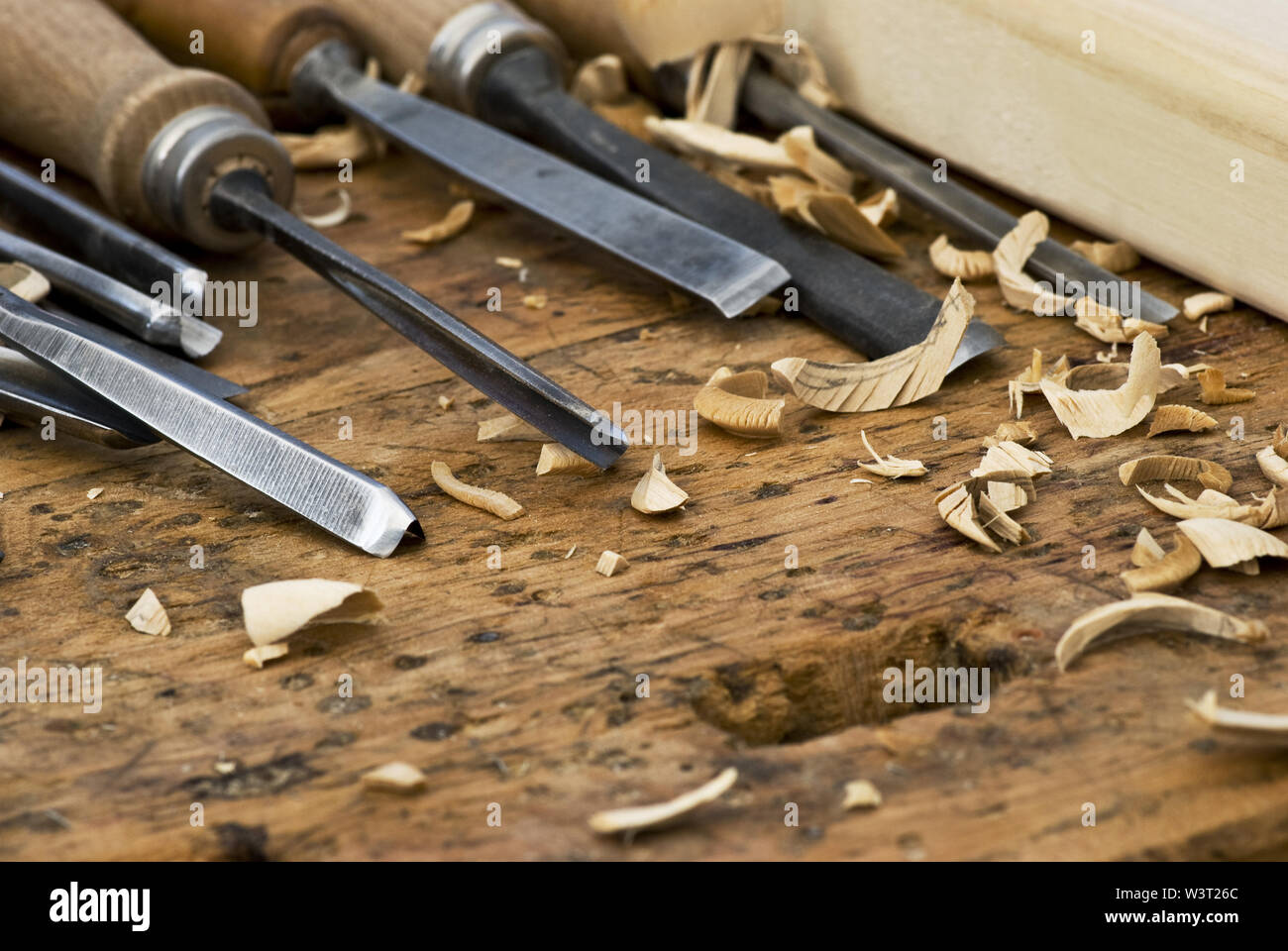 variety of metal chisels to carve wood on the craftsman's bench Stock Photo Alamy
