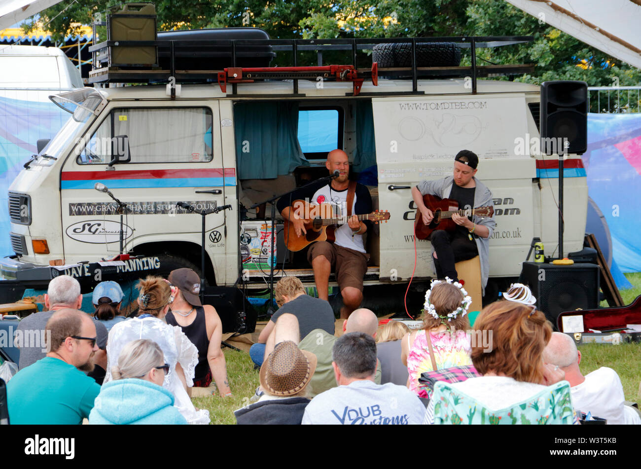 Guitar players performing at the 2019 Camper Jam festival in Weston