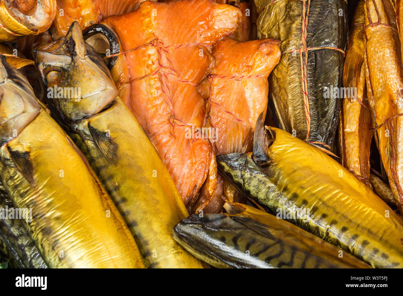 Counter with smoked fish in assortment Stock Photo Alamy