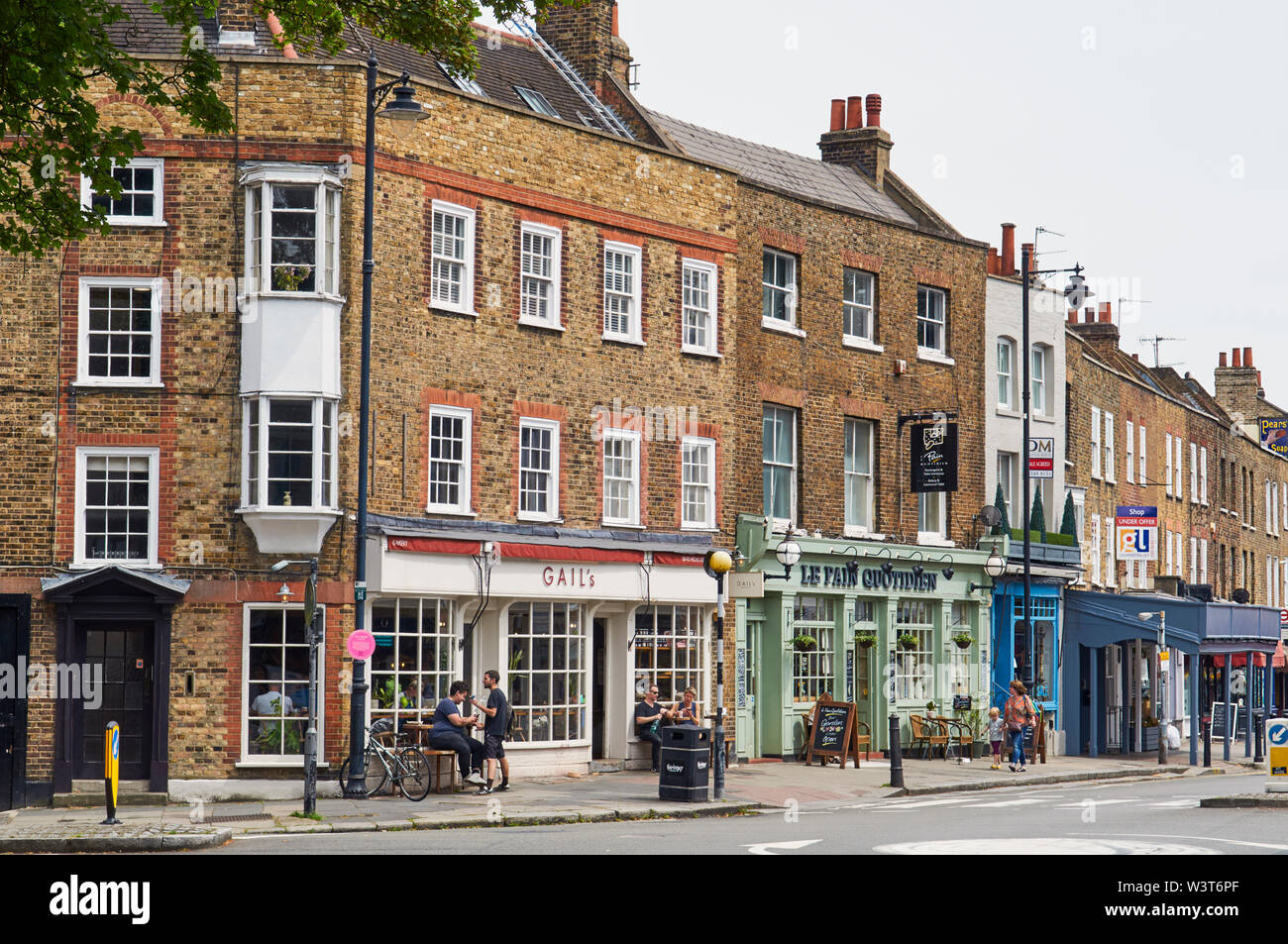 Cafes and shops on Highgate High Street in the upmarket London suburb of Highgate, North london UK Stock Photo