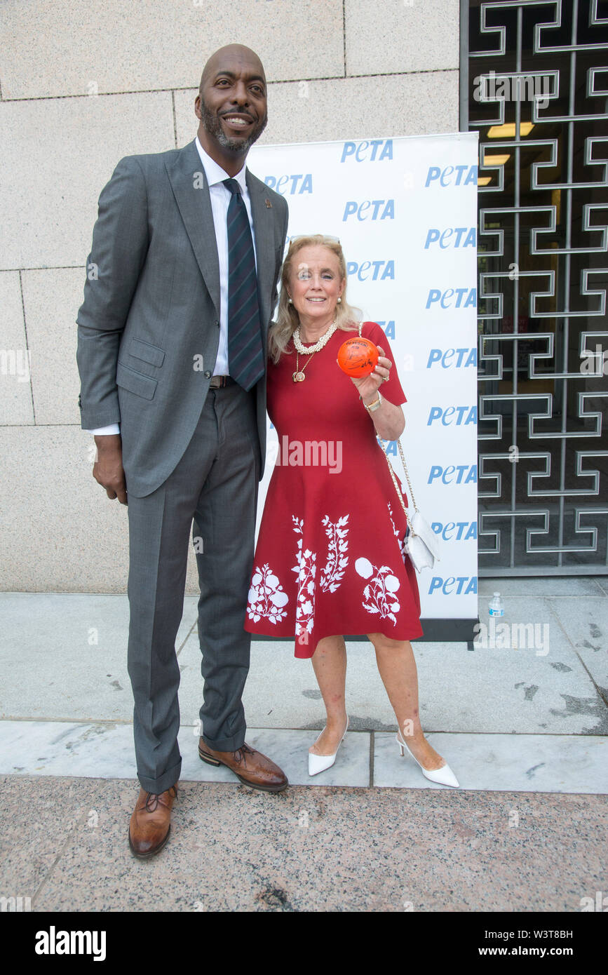Washington  DC, July 17, 2019, USA: Retired NBA Star, John Salley poses with Congresswoman Debbie Dingal, D-MI at the annual PETA (People for the Ethi Stock Photo