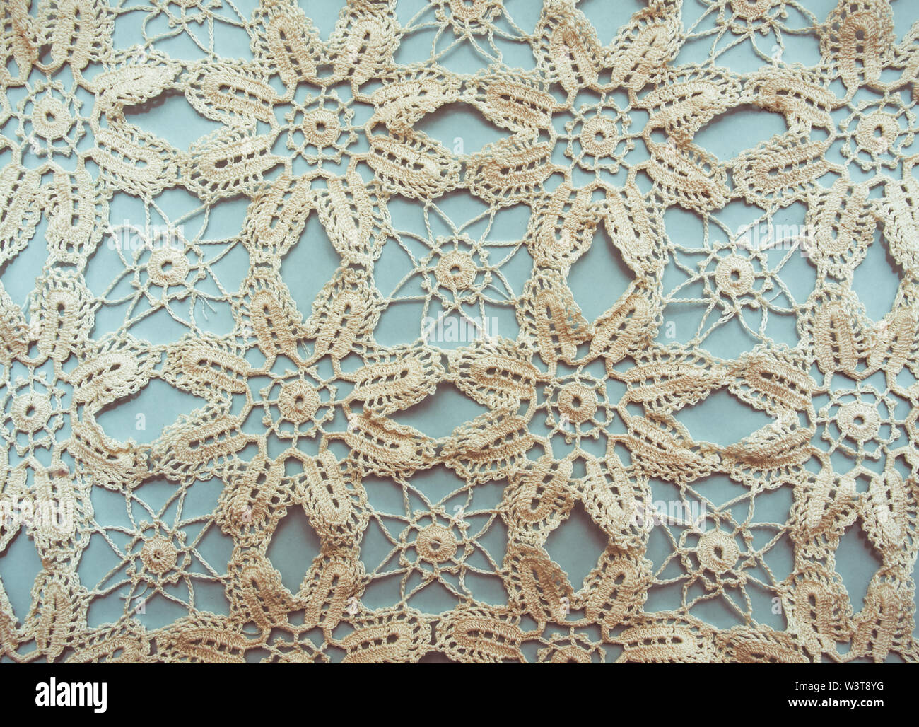 Hand Knitted Traditional Lace Mat Doily Isolated On Light Blue Background Vintage Photo Effect Stock Photo Alamy