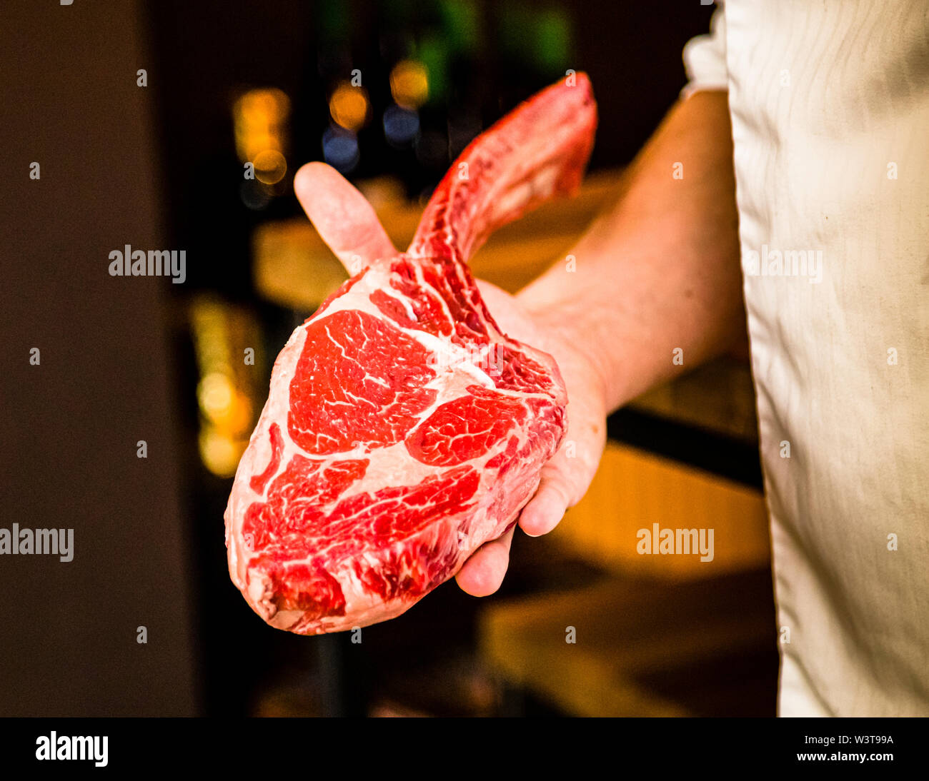Tomahawk steak in Bad Kissingen, Germany. Irish Tomahawk, Dry Aged weighs around one kilo depending on the cut. The masculine steak for connoisseurs can also be shared by 2 - 3 people. Stock Photo