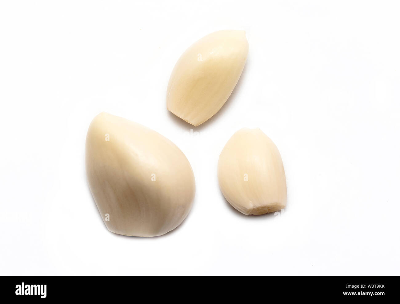 Top View of peeled Garlic isolated on white Background Stock Photo