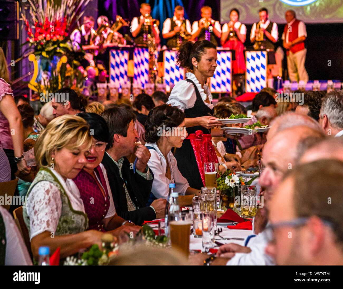 Crowning ceremony of Bavarian Potato-Queen 2019 in Schrobenhausen, Germany. This is how people in Bavaria celebrate the start of the new potato season. An evening-filling program by the 16 producer associations that belong to the Bavarian Potato Association. A big party for the outgoing and the new queen and all kinds of dishes from the early potato for around 500 guests. Stock Photo
