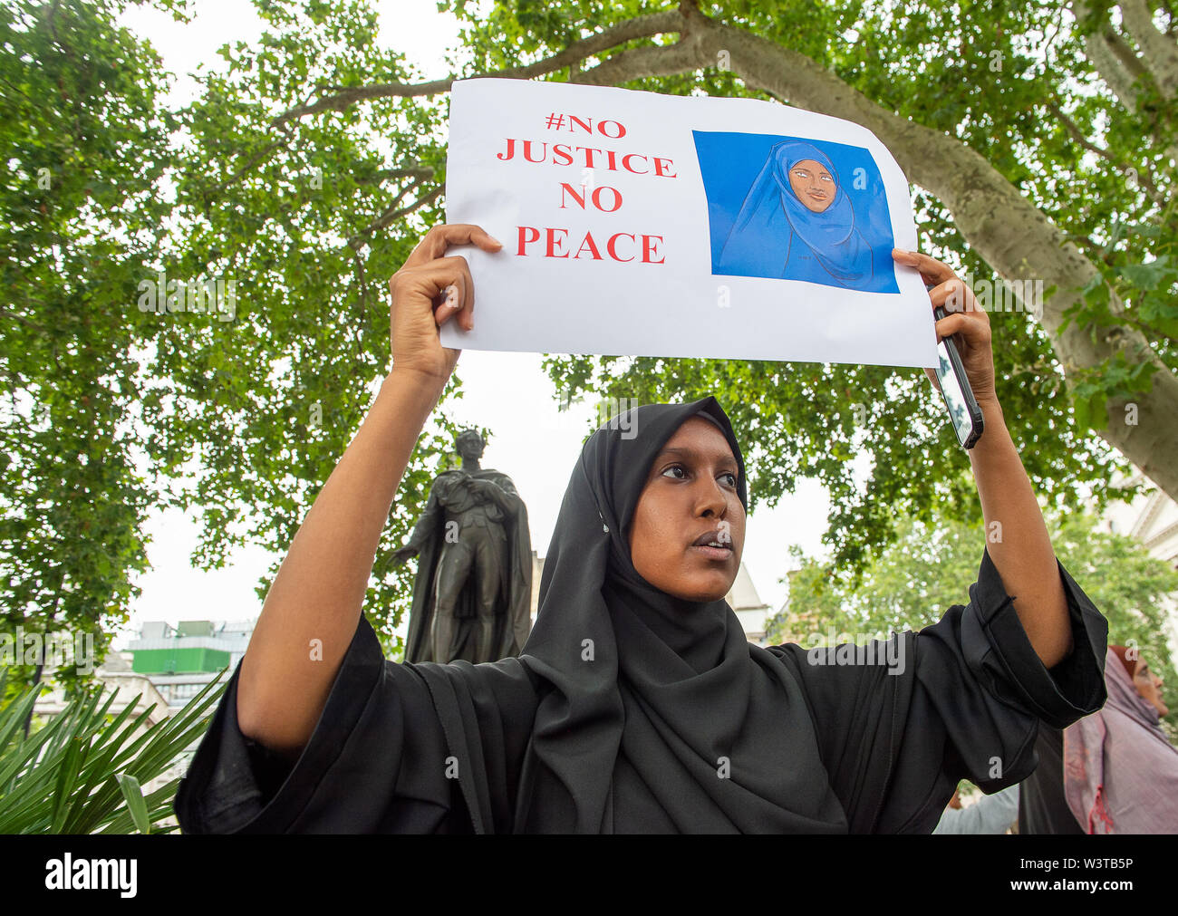 Justice for Shukri Abdi Protest, Parliament Square, Westminster, London, UK. 17th July, 2019. Members of the  UK Somalian community were out protesting this afternoon in Parliament Square about the death of a 12 year old Somalian girl called Adbi Skhuri from Bury. They are calling on authorities to launch a formal investigation into her death following alleged bullying at her school Broad Oak Sports College. Credit: Maureen McLean/Alamy Live News Stock Photo