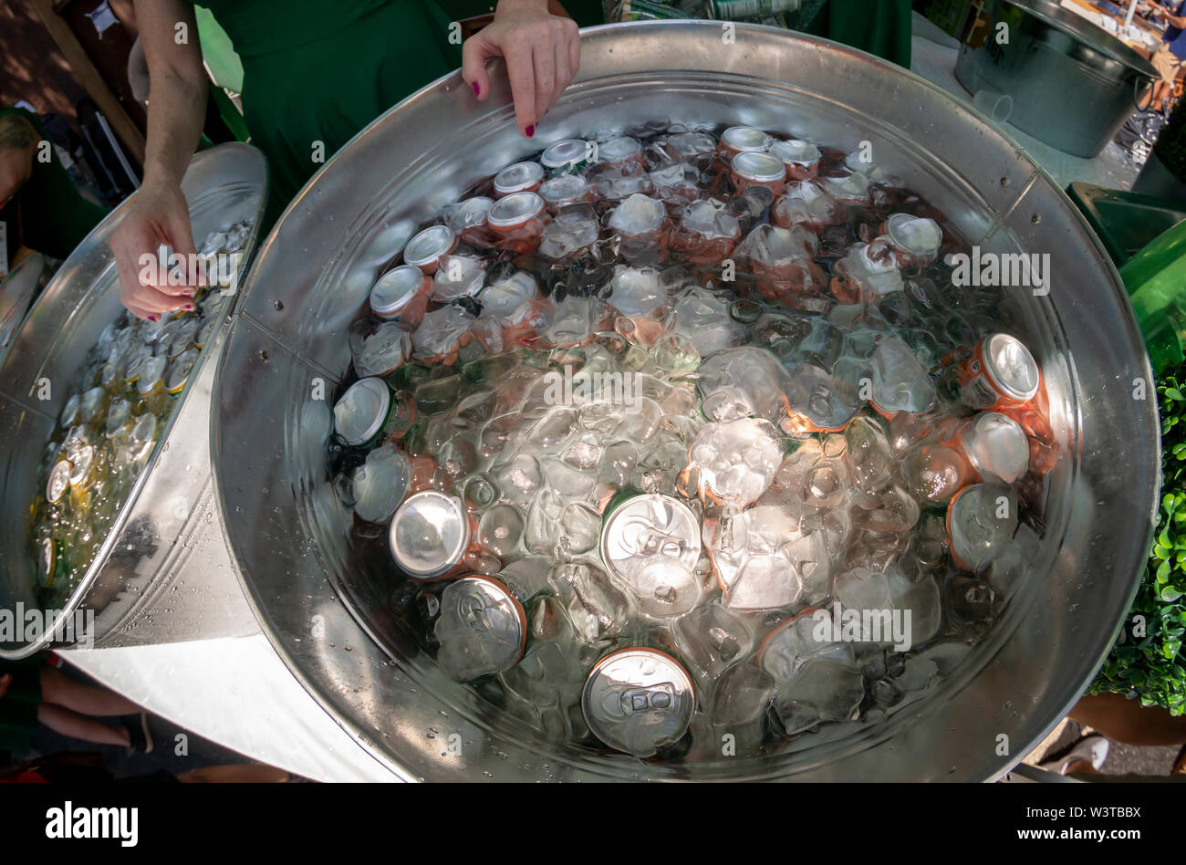 Cans of Perrier juice flavored carbonated water, seen at a street fair in New York on Sunday, July 14, 2019. The new product from Nestlé Waters, Perrier's parent company, addresses the increased popularity of flavored carbonated waters spear-headed by the millennial favorite La Croix. (© Richard B. Levine) Stock Photo