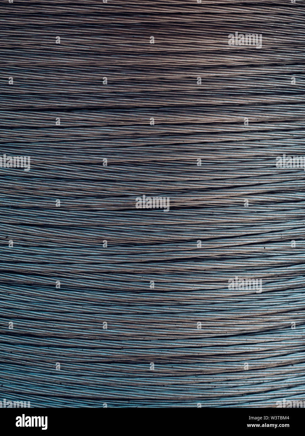 Steel or metal rope, wire. Building material concept Stock Photo - Alamy
