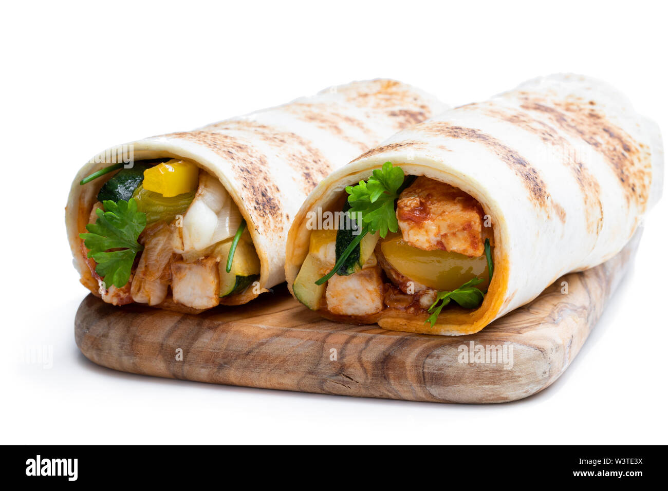 Homemade grilled chicken burrito with vegetables and tortilla isolated on white Stock Photo Alamy