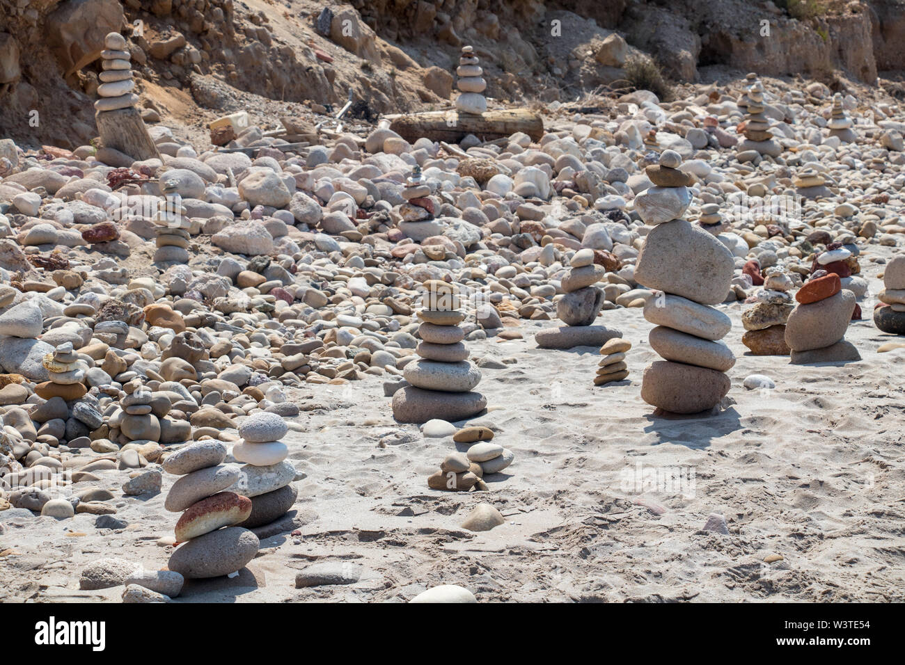 beach full of rock sculptures Stock Photo Alamy
