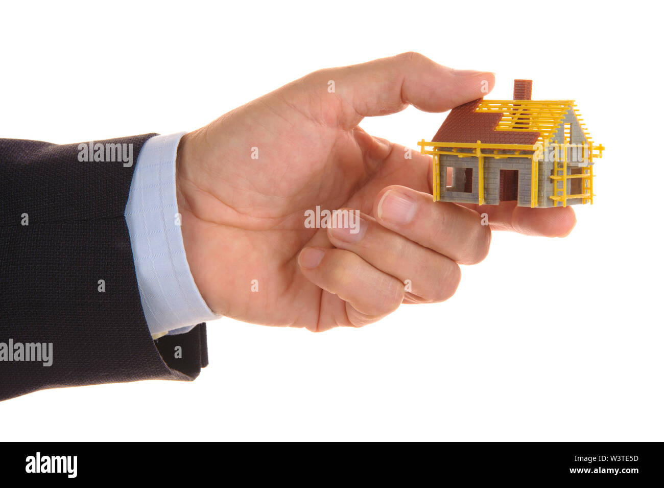 model house in hand of agent Stock Photo