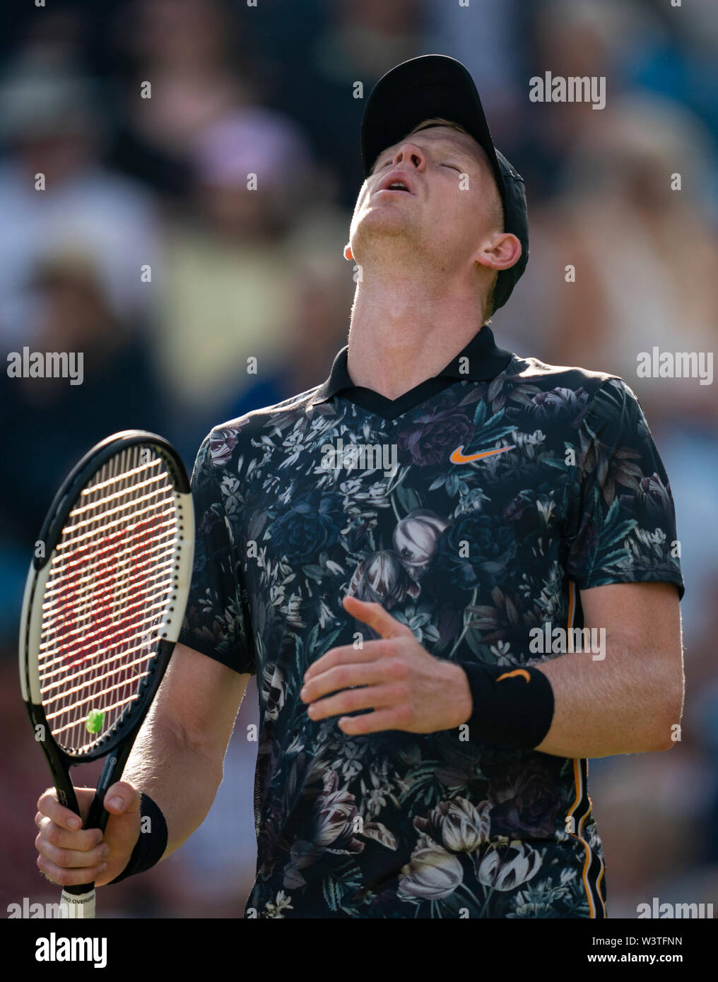 Kyle Edmund of GBR reacting to shot against Taylor Fritz of USA at Nature Valley International 2019, Devonshire Park, Eastbourne - England. Friday, 28 Stock Photo