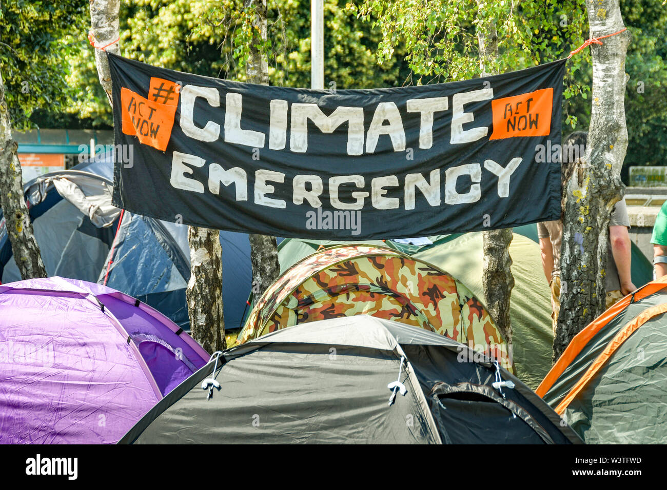 CARDIFF, WALES - JULY 2019: 'Climate Emergency' banner in a makeshift campsite in Cardiff during a climate change protest by Extinction Rebellion Stock Photo