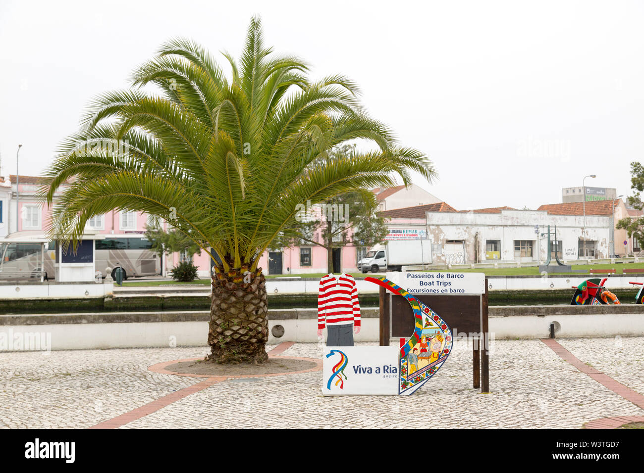 Advertisement with display, next to a palm tree, advertising Cojo canal tours. Stock Photo