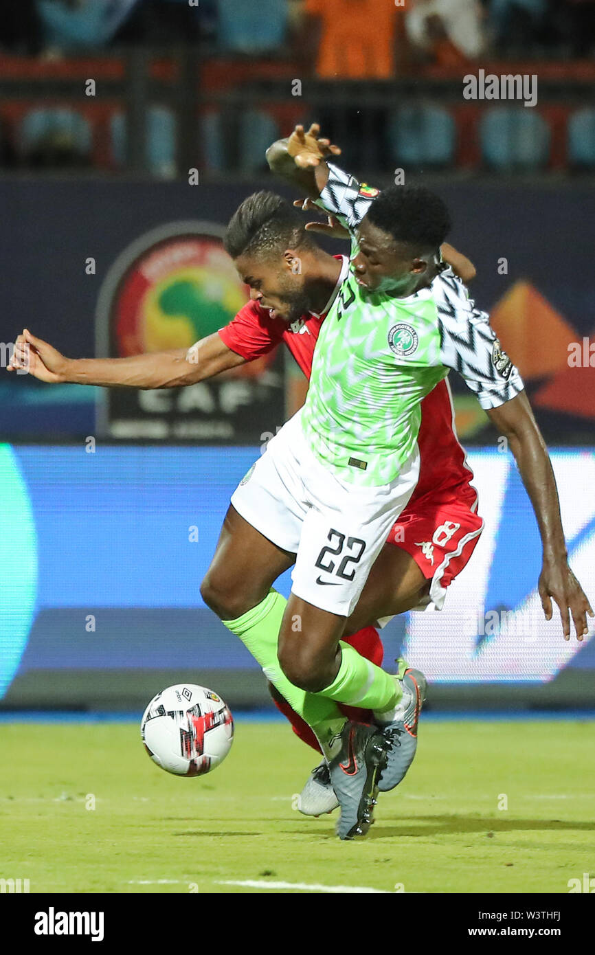 Cairo, Egypt. 17th July, 2019. Tunisia's Firas Chaouat vies for the ball with Nigeria's Kenneth Omeruo during the 2019 Africa Cup of Nations third place final soccer match between Tunisia and Nigeria at the Al-Salam Stadium. Credit: Omar Zoheiry/dpa/Alamy Live News Stock Photo
