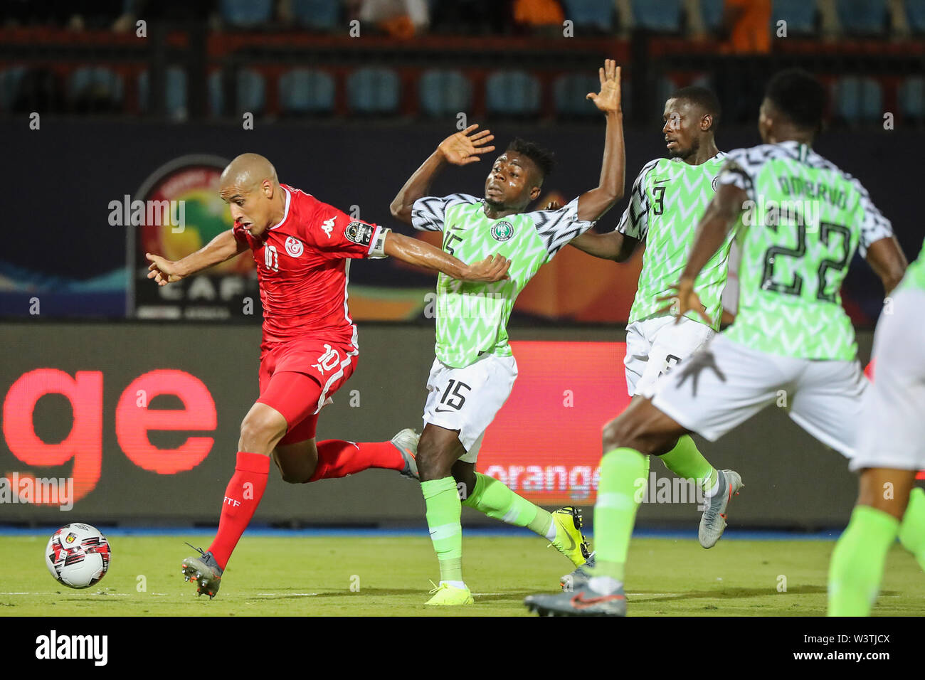 Cairo, Egypt. 17th July, 2019. Tunisia's Wahib Khazri vies for the ball with Nigeria's Moses Simon, Nigeria's Jamilu Collins, and Nigeria's Kenneth Omeruo during the 2019 Africa Cup of Nations third place final soccer match between Tunisia and Nigeria at the Al-Salam Stadium. Credit: Omar Zoheiry/dpa/Alamy Live News Stock Photo