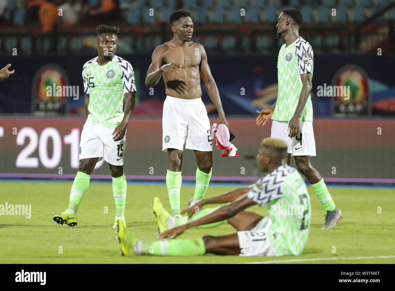 Cairo, Egypt. 17th July, 2019. Nigeria's Moses Simon, Nigeria's Ola Aina, Nigeria's Victor Osimhen, and Nigeria's Wilfred Ndidi react after winning the 2019 Africa Cup of Nations third place final soccer match between Tunisia and Nigeria at the Al-Salam Stadium. Credit: Gehad Hamdy/dpa/Alamy Live News Stock Photo