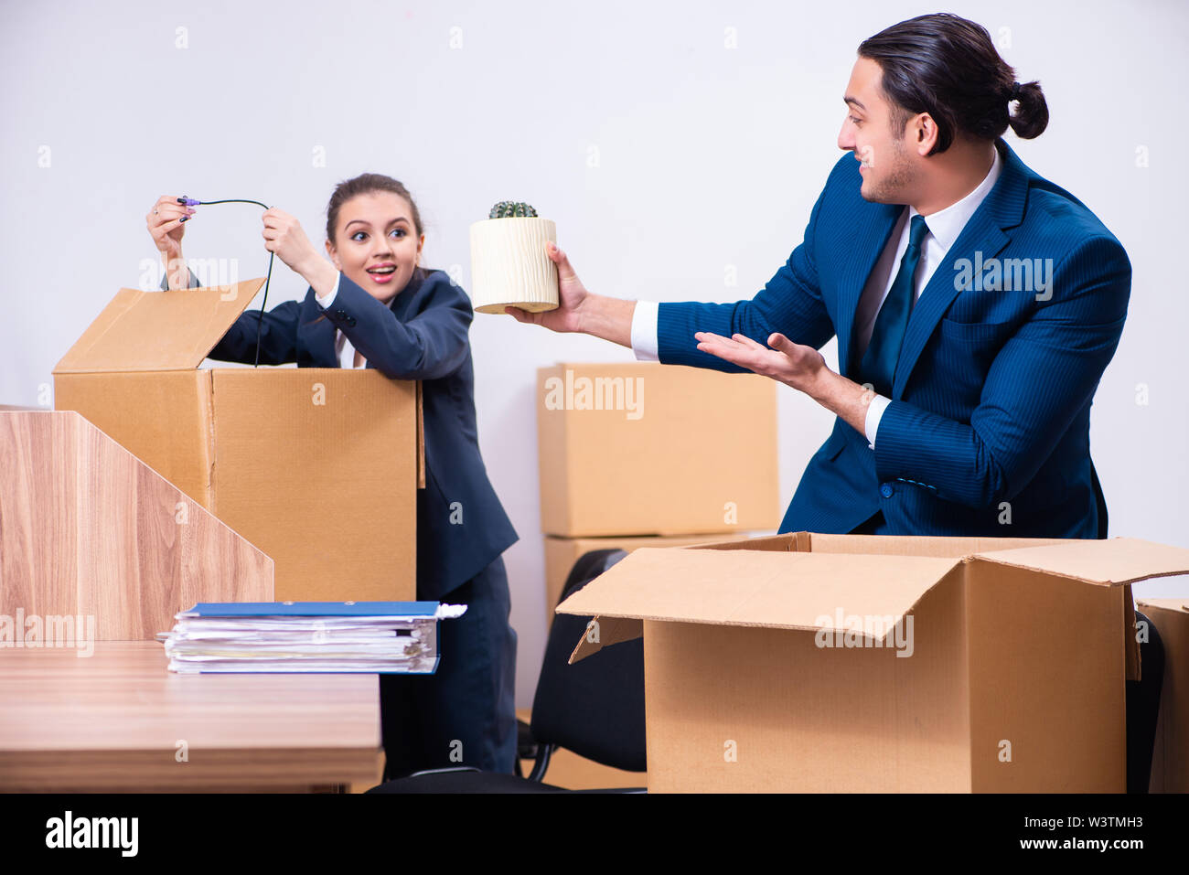 The two employees being fired from their work Stock Photo - Alamy