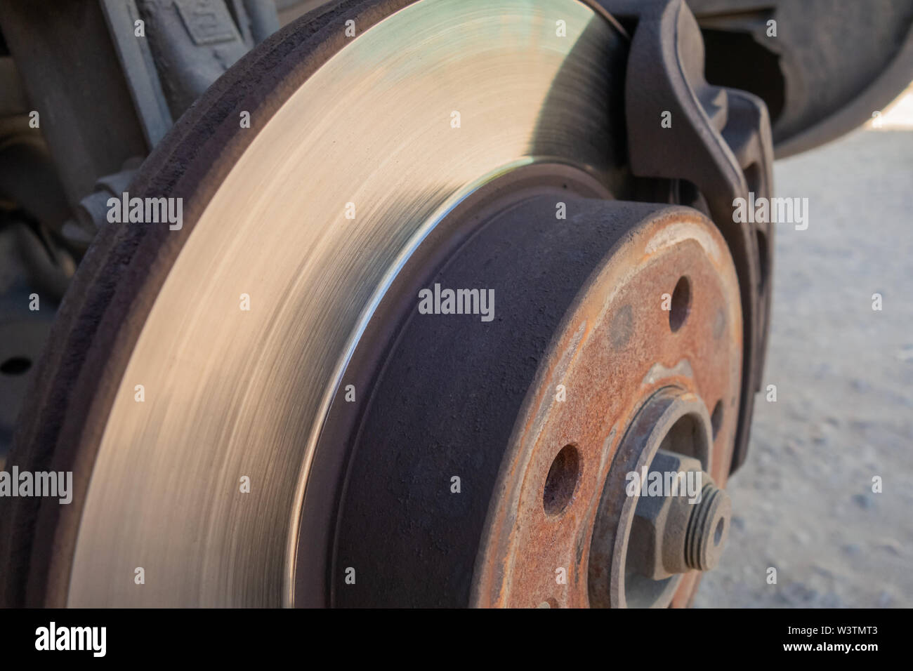 Brake disc and car caliper. The picture with the wheel removed for tire